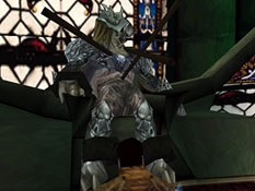 The evolved vampire lieutenant Dumah, staked and bound to his throne